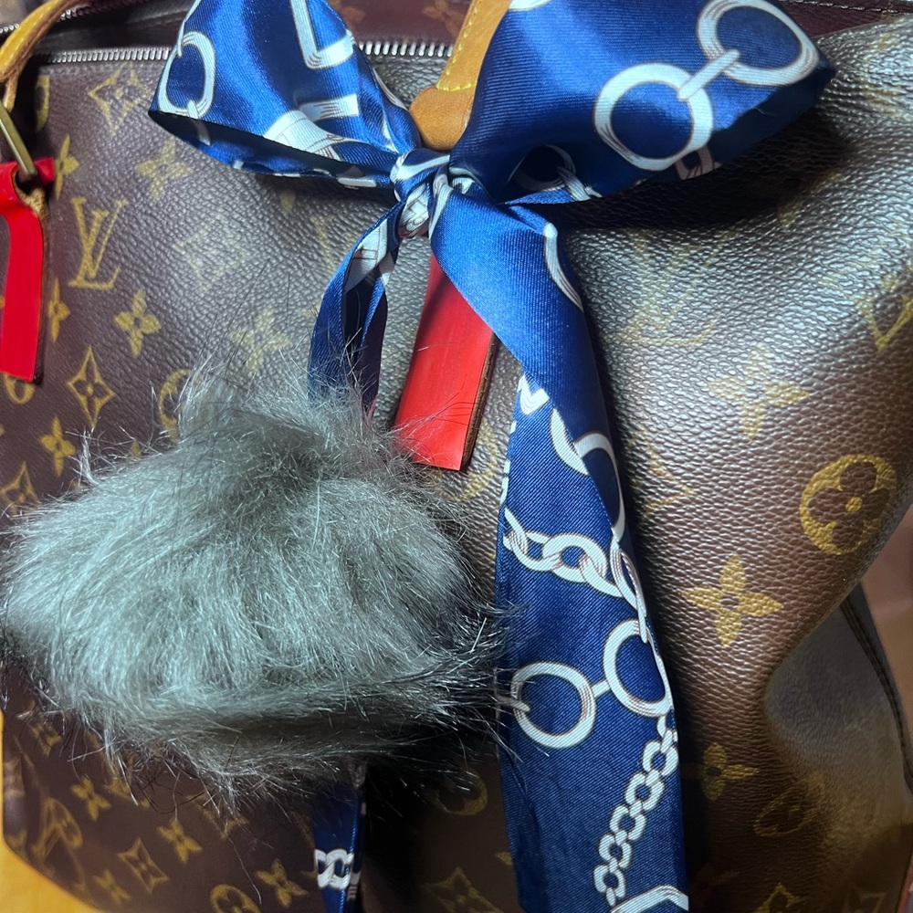 Blue and Gray Patterned Ribbon 🎀 and fluffy ball.